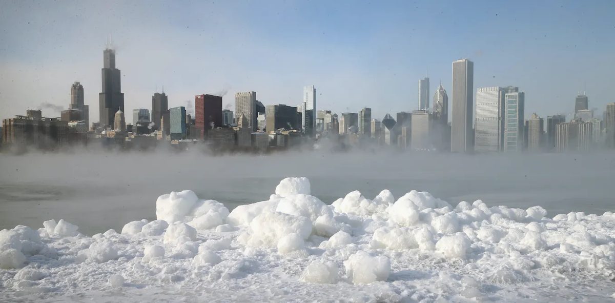 With the Chicago skyline in the background, water vapor rises from the surface of Lake Michigan during a sub-zero day in January 2014.