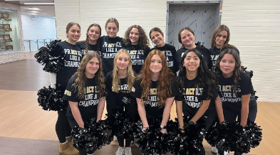 Pictured above are the girls at the school parade, sending off Cassandra Chowaniak. (People who are on the team but not in the picture include Bella Corso, Serena Braglia, and Matthew McClain.)