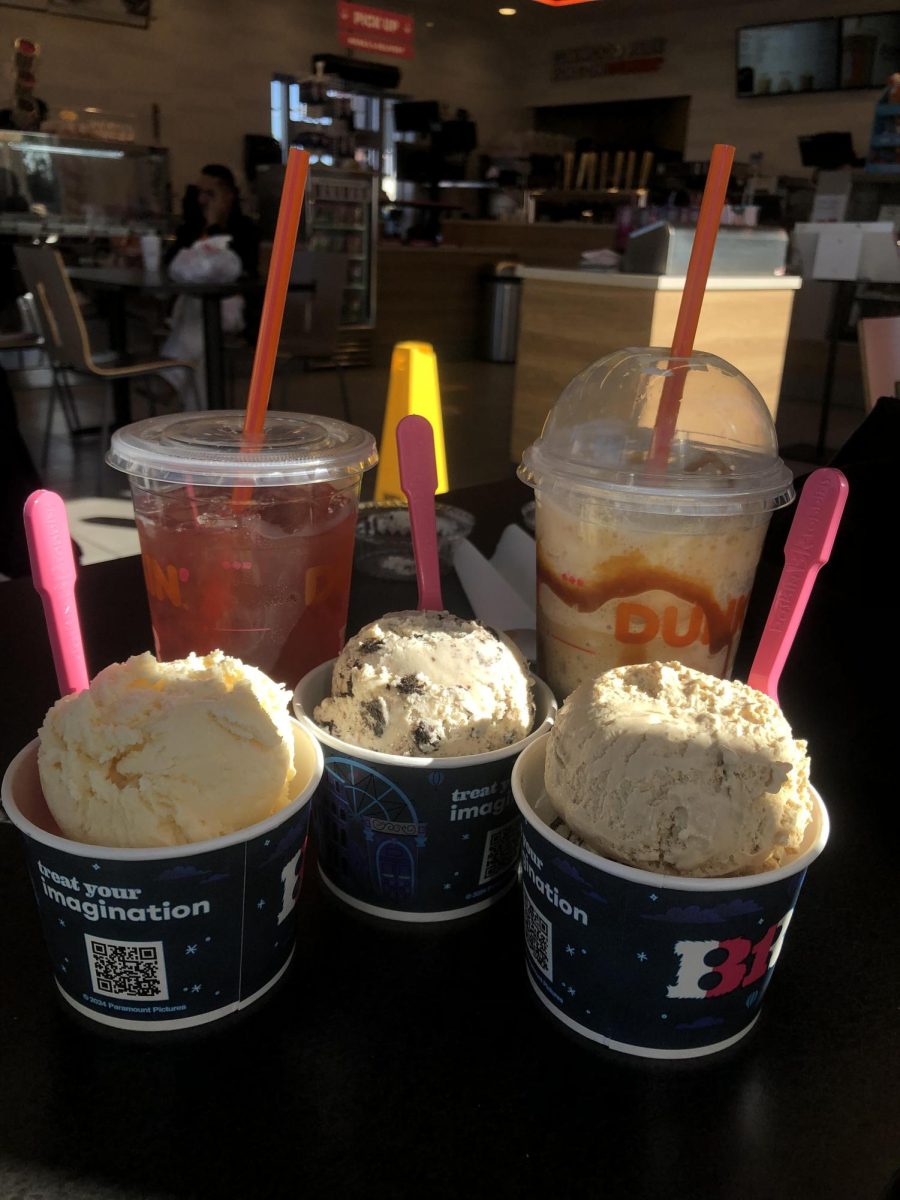 This photo was taken at Dunkin by me. The photo has two drinks and three ice creams.