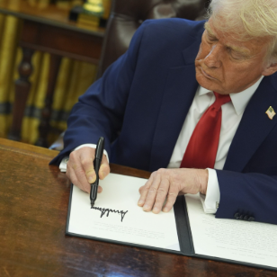 Trump signing off on the tariffs. The tariffs are put onto China.