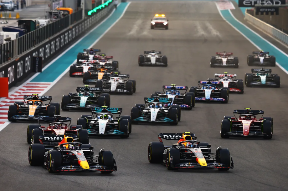 F1 cars racing followed by a safety car. Taken place at the Abu Dhabi Grand Prix.