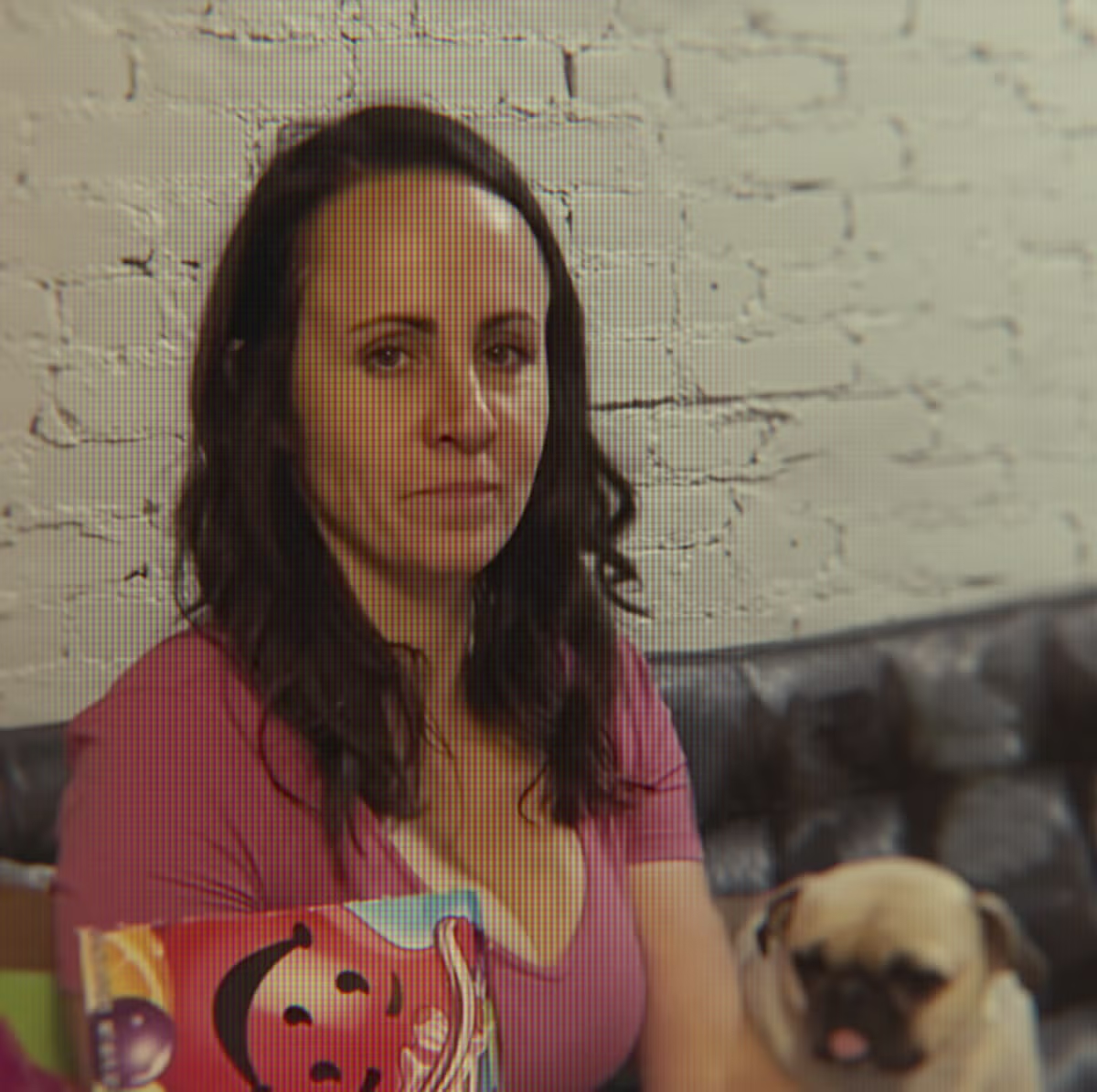 Tiffany Smith with Frank the pug, one of her alter egos. This photo captures the soulless eyes she has. 