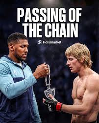 Instagram post published by @polymarketsports in which UFC fighter, Paddy Pimblett is being handed a Polymarket chain 